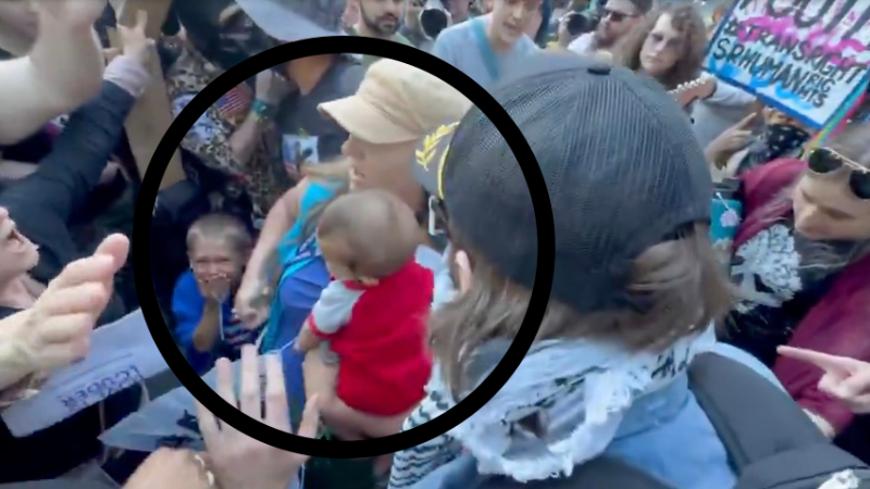 Arrests, FBI investigation follow pro-trans radicals surrounding
mother holding a baby at Christian group's Seattle rally
