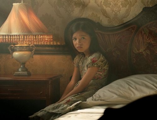 Movie image girl sitting on bed